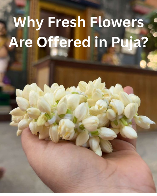 Fresh flowers offered during Hindu puja in home temple