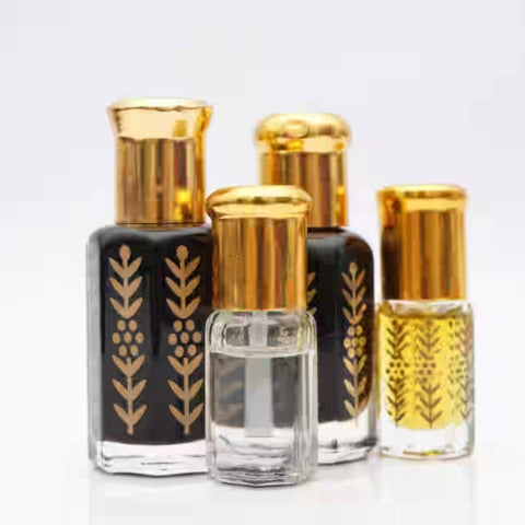 Assorted Floral Attar Bottles – Black & Clear with Gold Tops