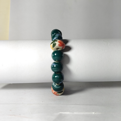 Handcrafted Green Beaded Bracelet with Floral Ceramic Pendant – Elegant Jewelry for Women