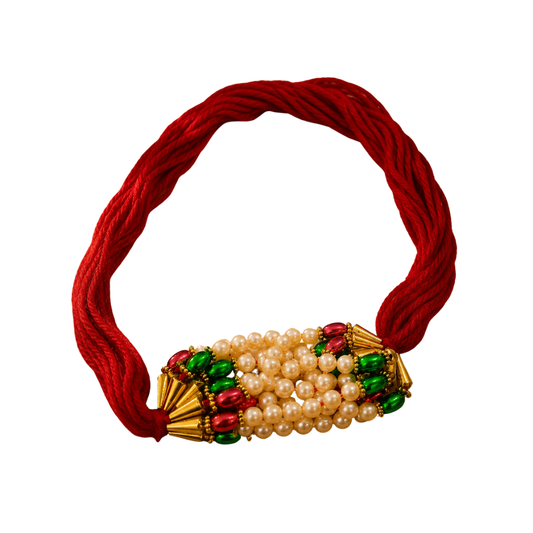 Premium Beaded Pearl Rakhi – Red Mauli Thread with Green & Red Decorative Beads