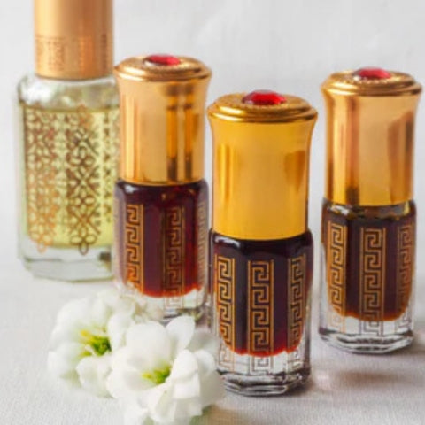 Sacred Dubai Attar Set – Ornate Gold Pooja Bottles.